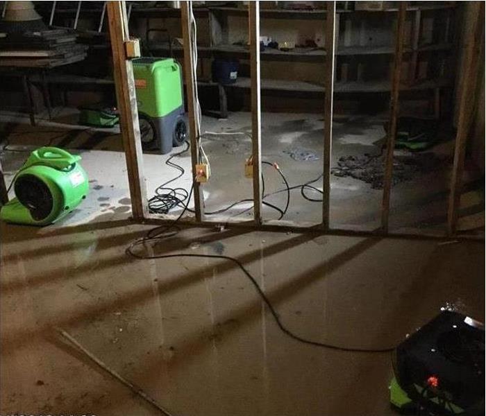 Image of SERVPRO's drying equipment in water damaged home.