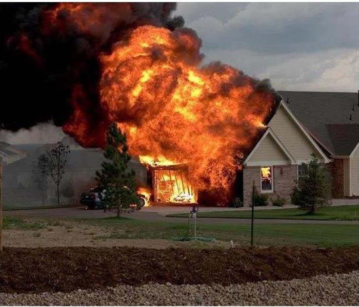 Image of a house on fire. 