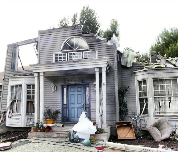 Image a damaged house 