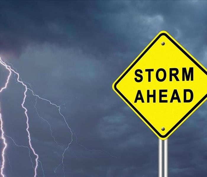 Image of a sign indicating "storm ahead" 